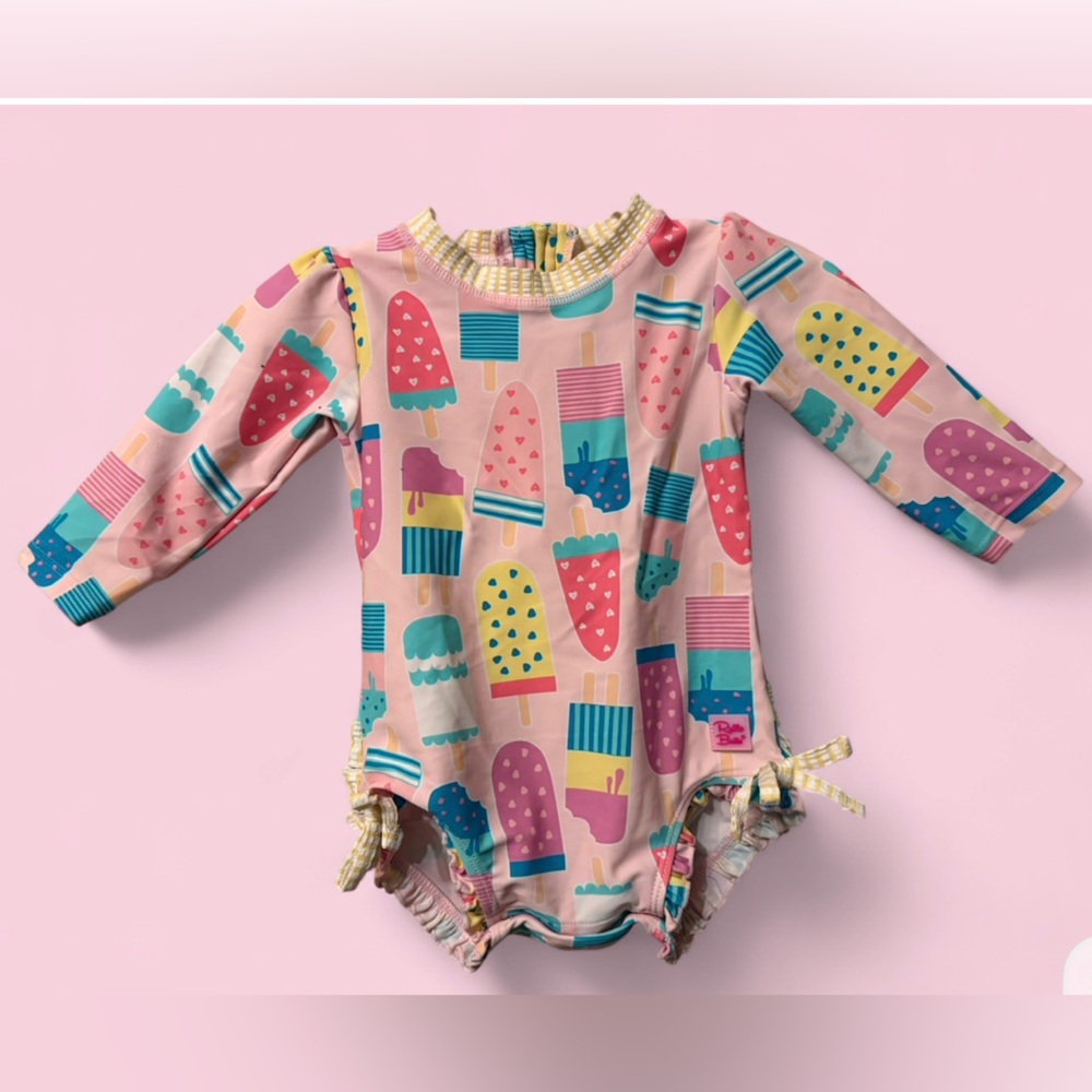 RuffleButts Baby Girl Pink Popsicle Print Rashguard Swimsuit 6–12M UPF